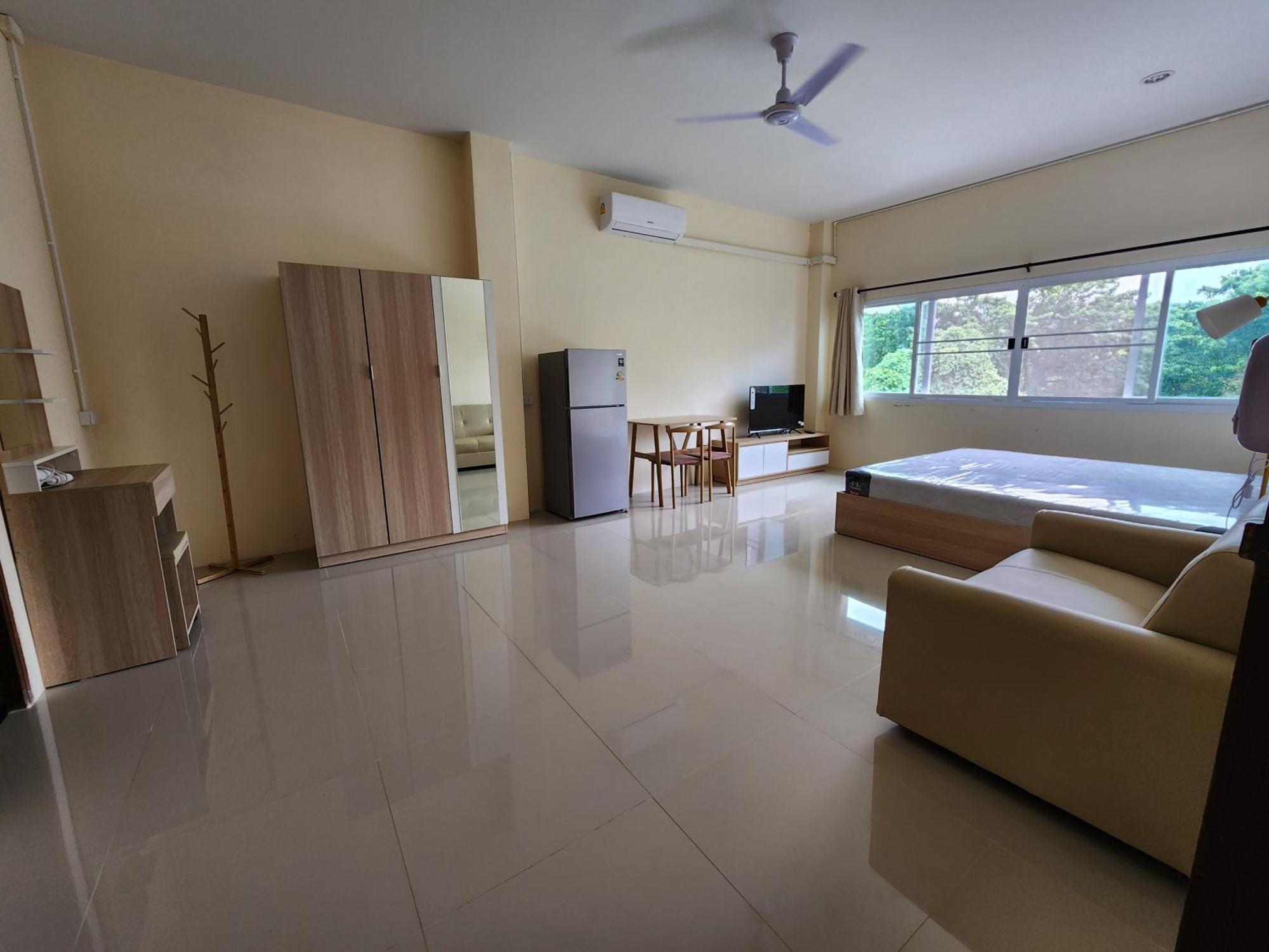 Skypearl Guesthouse & Pub Тау Экстерьер фото